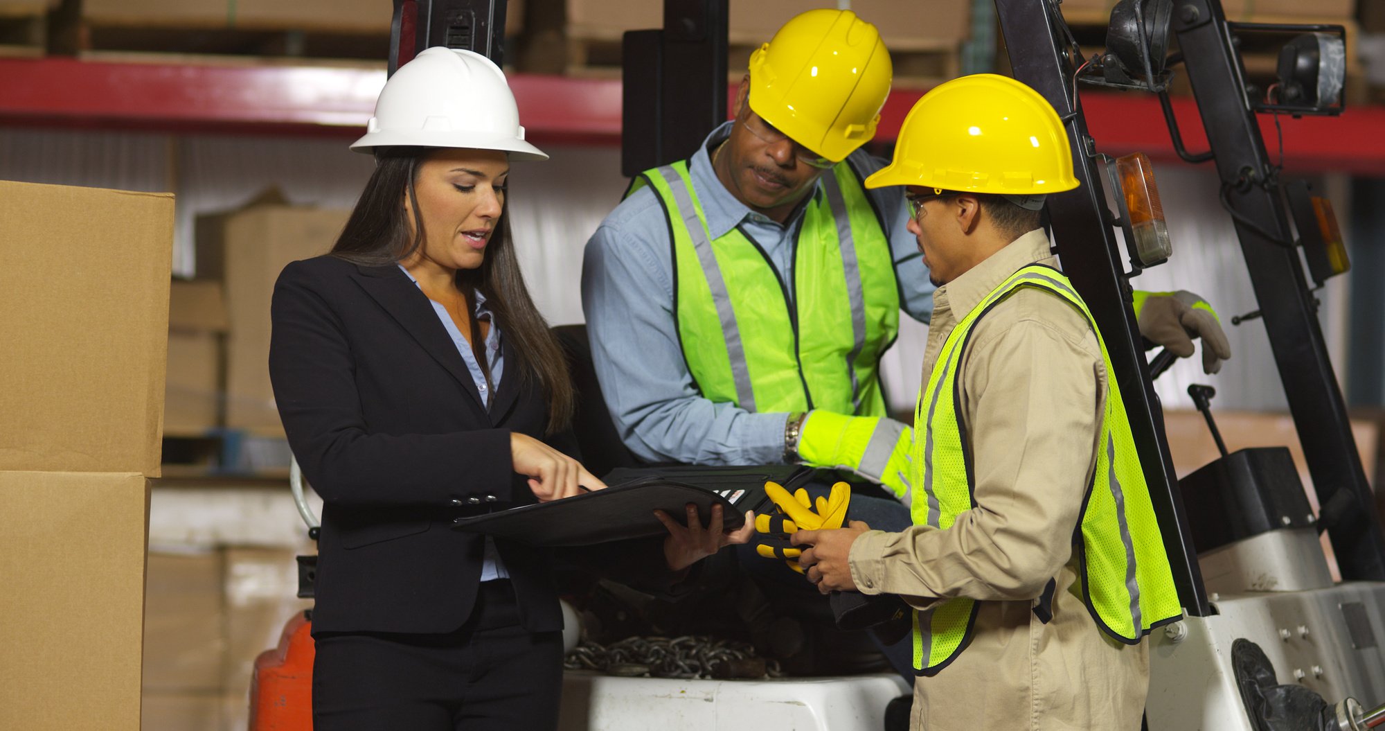 People working together in shipping warehouse